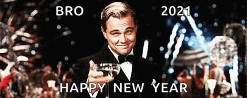 A Man In A Tuxedo Holds A Glass Of Champagne And Says Bro Happy New Year 2021 GIF