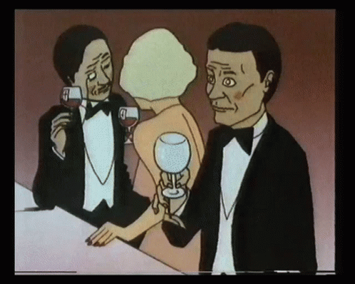 A Man In A Tuxedo Holds A Glass Of Wine While A Woman Holds A Glass Of Wine GIF