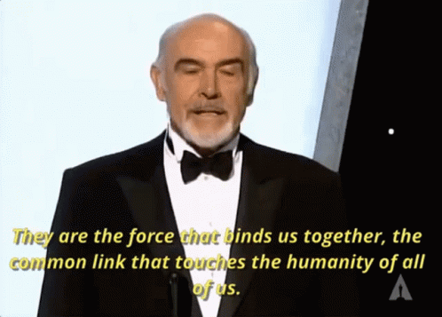 A Man In A Tuxedo Is Giving A Speech And Says " They Are The Force That Binds Us Together " GIF