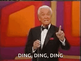 A Man In A Tuxedo Is Giving A Thumbs Up And Saying Ding Ding Ding . GIF