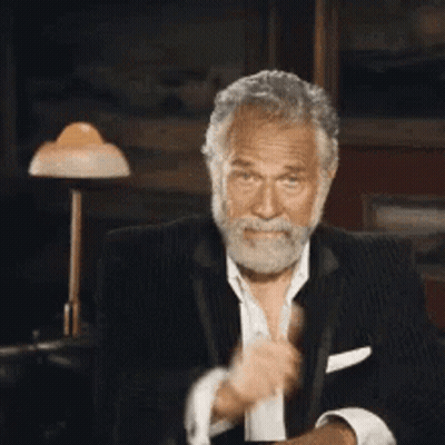A Man In A Tuxedo Is Giving A Thumbs Up GIF