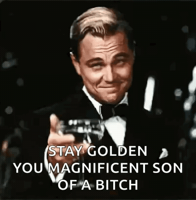 A Man In A Tuxedo Is Holding A Glass Of Wine And Toasting . GIF