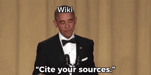 A Man In A Tuxedo Is Holding A Microphone And Says " Cite Your Sources " GIF