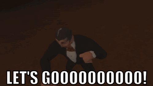 A Man In A Tuxedo Is Laying On The Ground With The Words Let 'S Gooooooo000 Written Above Him GIF