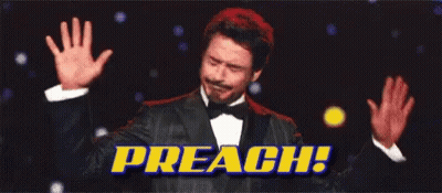 A Man In A Tuxedo Is Raising His Hands In The Air With The Words Preach Behind Him . GIF