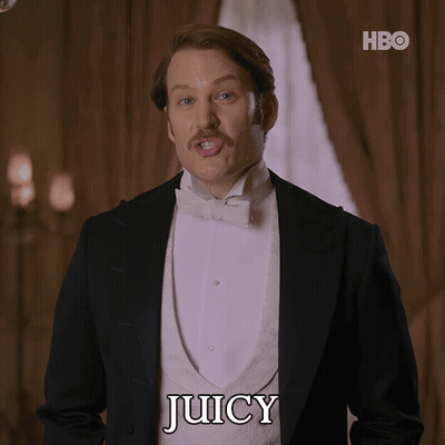 A Man In A Tuxedo Is Saying Juicy In Front Of A Hbo Logo GIF