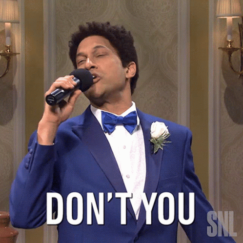 A Man In A Tuxedo Is Singing Into A Microphone And Says " Don 'T You " GIF