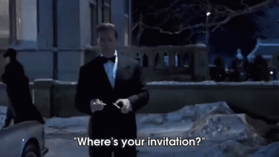 A Man In A Tuxedo Is Standing In The Snow And Talking About Where 'S Your Invitation . GIF