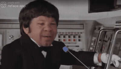 A Man In A Tuxedo Is Talking Into A Microphone With The Words Made With Reface App On The Bottom GIF