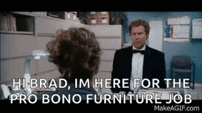A Man In A Tuxedo Is Talking To A Woman In An Office And Asking Her For A Furniture Job . GIF