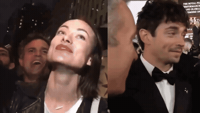 A Man In A Tuxedo Kisses A Woman 'S Forehead GIF