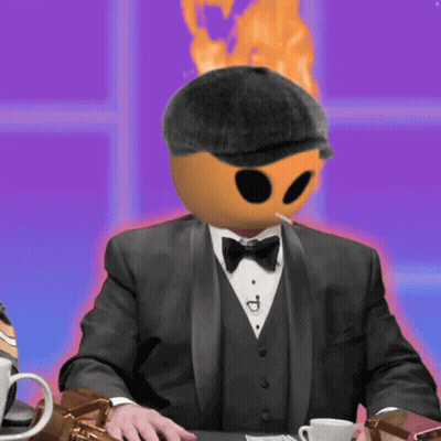 A Man In A Tuxedo Smoking A Cigarette With A Fireball On His Head GIF