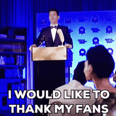 A Man In A Tuxedo Stands At A Podium Giving A Speech And Says I Would Like To Thank My Fans GIF