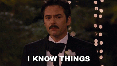 A Man In A Tuxedo With A Mustache Says I Know Things GIF