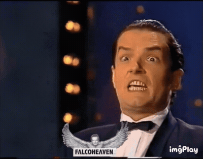 A Man In A Tuxedo With His Mouth Open And A Falconheaven Logo In The Background GIF