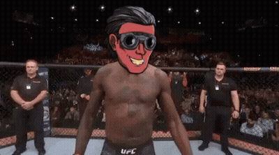 A Man In A Ufc Ring With A Red Face GIF