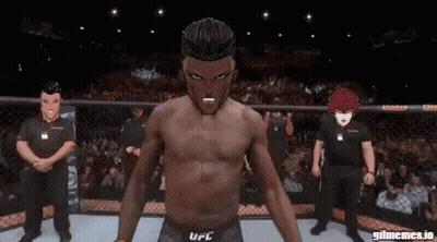 A Man In A Ufc Uniform Stands In Front Of A Crowd GIF