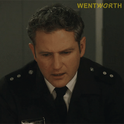 A Man In A Uniform With The Word Wentworth On The Bottom Right GIF