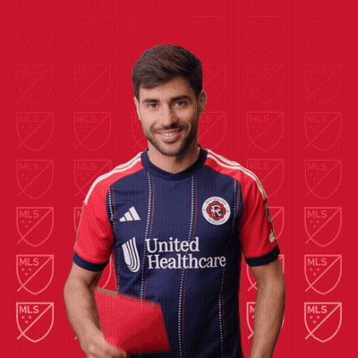 A Man In A United Healthcare Jersey Holds A Red Card GIF