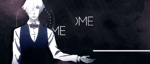 A Man In A Vest And Bow Tie Is Standing In Front Of A Sign That Says Ndeelcome Wel Tocim GIF