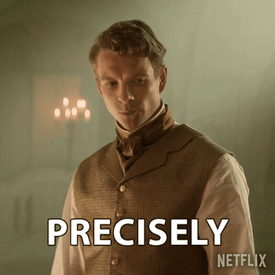 A Man In A Vest And Tie Has The Word Precisely On His Chest GIF