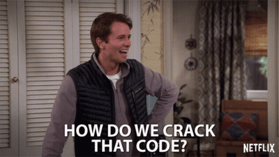 A Man In A Vest Says How Do We Crack That Code In A Netflix Ad GIF