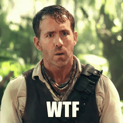 A Man In A Vest With The Word Wtf Written On His Chest GIF