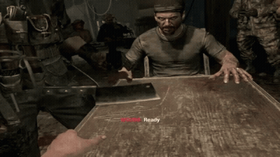 A Man In A Video Game Is Sitting At A Table With A Bloody Knife And The Word Ready On The Table GIF