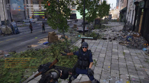 A Man In A Video Game Is Standing On A Brick Sidewalk Holding A Rifle GIF