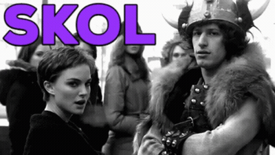 A Man In A Viking Costume Stands Next To A Woman In A Black And White Photo With The Word Skol In Purple GIF