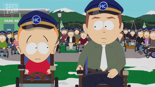 A Man In A Wheelchair And A Man In A Hat With Hc On It GIF