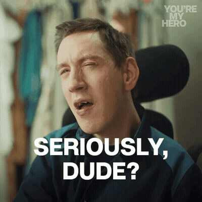 A Man In A Wheelchair Is Making A Funny Face And Says Seriously Dude GIF