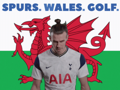 A Man In A White Aia Jersey Stands In Front Of A Dragon GIF