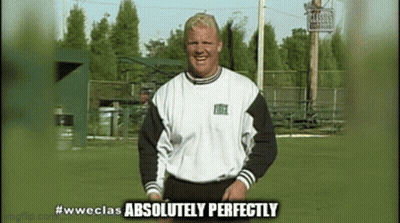 A Man In A White And Black Shirt Is Standing In A Field With The Words Absolutely Perfectly Below Him GIF