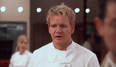 A Man In A White Chef 'S Uniform Looks At The Camera With His Mouth Open GIF