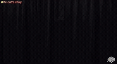A Man In A White Jacket And Gold Shorts Is Standing In Front Of A Black Curtain And Screaming . GIF