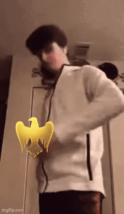 A Man In A White Jacket Is Standing In Front Of A Door With A Yellow Bird On It GIF