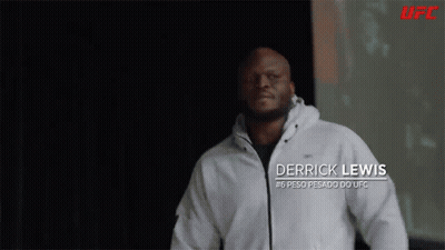 A Man In A White Jacket With The Name Derrick Lewis On The Front GIF