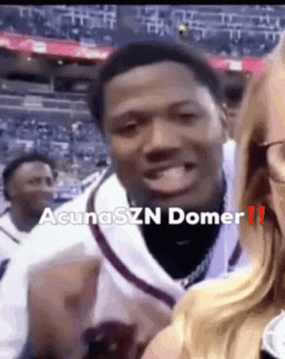 A Man In A White Jersey With The Name Acunaszn Domer On The Bottom GIF