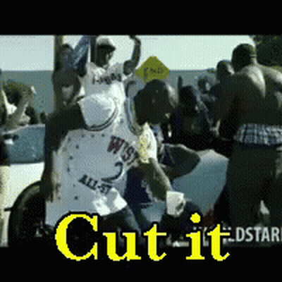 A Man In A White Jersey With The Word West On It Stands In Front Of A Crowd GIF