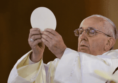 A Man In A White Robe Holds A White Plate In His Hands GIF