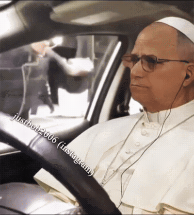A Man In A White Robe Is Sitting In A Car With A Caption That Says Justbob2006 GIF