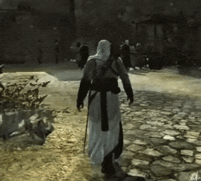 A Man In A White Robe Is Walking Down A Cobblestone Street In A Video Game GIF