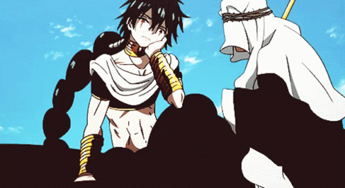 A Man In A White Robe Sits Next To Another Man In A White Robe GIF
