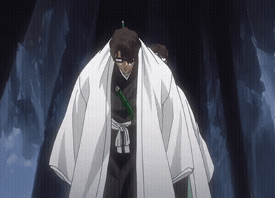 A Man In A White Robe With A Green Sword GIF