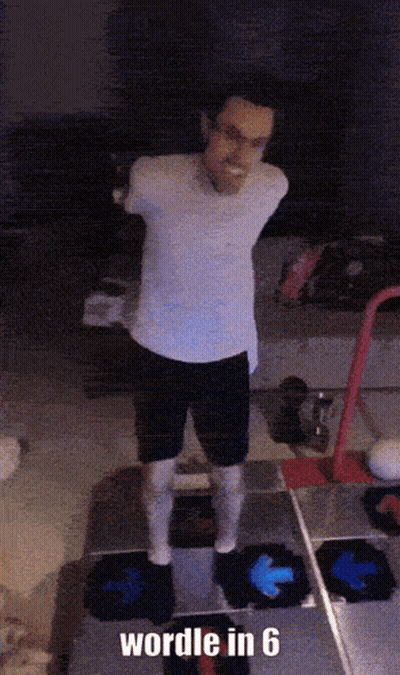A Man In A White Shirt And Black Shorts Is Standing On A Dance Floor With The Words " Wordle In 6 " Below Him GIF
