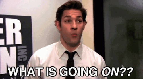 A Man In A White Shirt And Black Tie Is Asking What Is Going On GIF