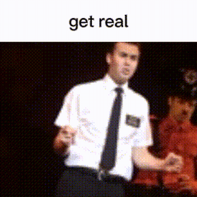 A Man In A White Shirt And Black Tie Is Standing In Front Of A Black Background With The Words Get Real On The Bottom GIF
