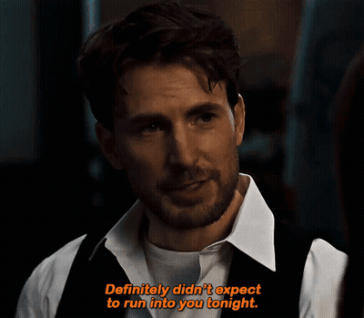 A Man In A White Shirt And Black Vest Says " Definitely Didn 'T Expect To Run Into You Tonight " GIF