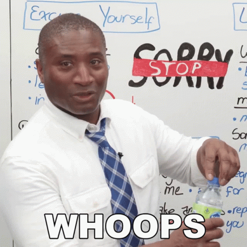 A Man In A White Shirt And Tie Holds A Bottle In Front Of A Whiteboard That Says Sorry Stop GIF